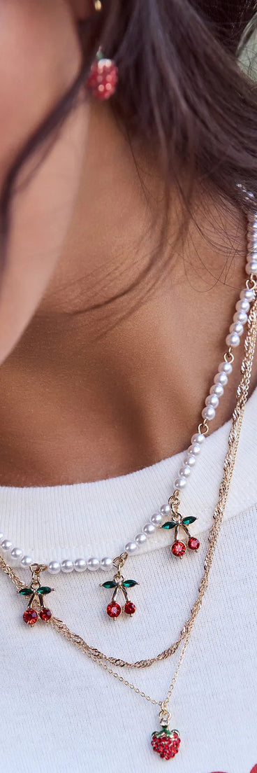 Stay on-trend this season with the In Season Strawberry Earrings And Necklace Set in gold, a must-have for creating stylish and effortless spring outfits for women.