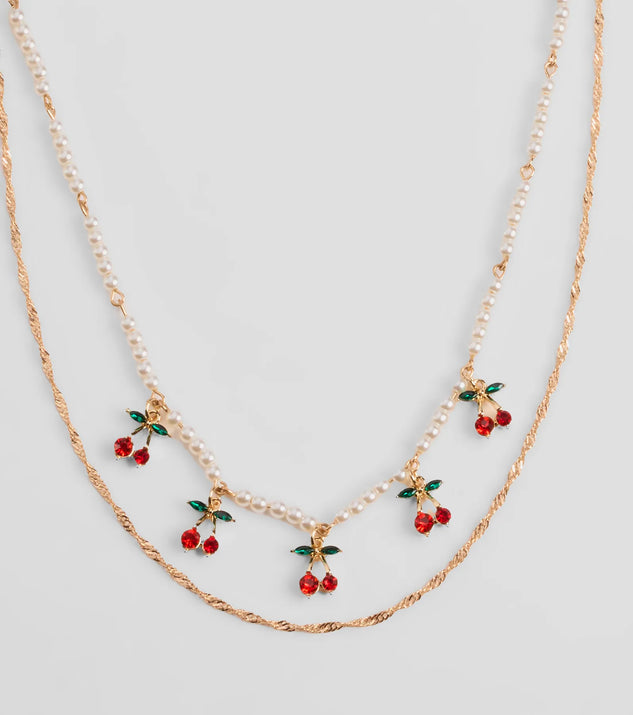 Stay on-trend this season with the Taste So Sweet Cherry And Faux Pearl Layered Necklace in gold, a must-have for creating stylish and effortless spring outfits for women.