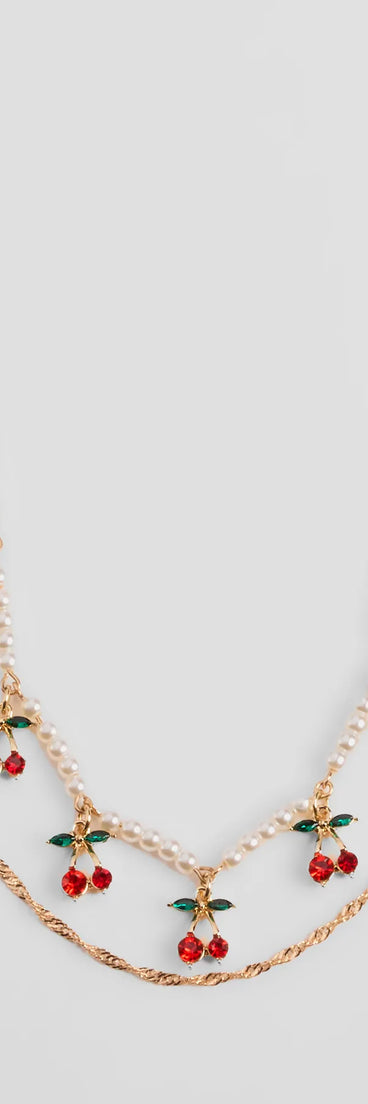 Stay on-trend this season with the Taste So Sweet Cherry And Faux Pearl Layered Necklace in gold, a must-have for creating stylish and effortless spring outfits for women.