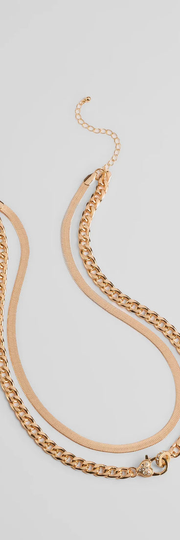 The Sweet And Edgy Heart Layered Chain Necklace in gold brings edge and energy to your vibe, ready to elevate any festival look or concert outfit.