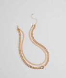 The Sweet And Edgy Heart Layered Chain Necklace in gold brings edge and energy to your vibe, ready to elevate any festival look or concert outfit.