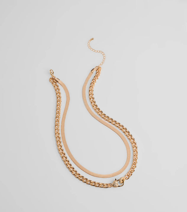 The Sweet And Edgy Heart Layered Chain Necklace in gold brings edge and energy to your vibe, ready to elevate any festival look or concert outfit.