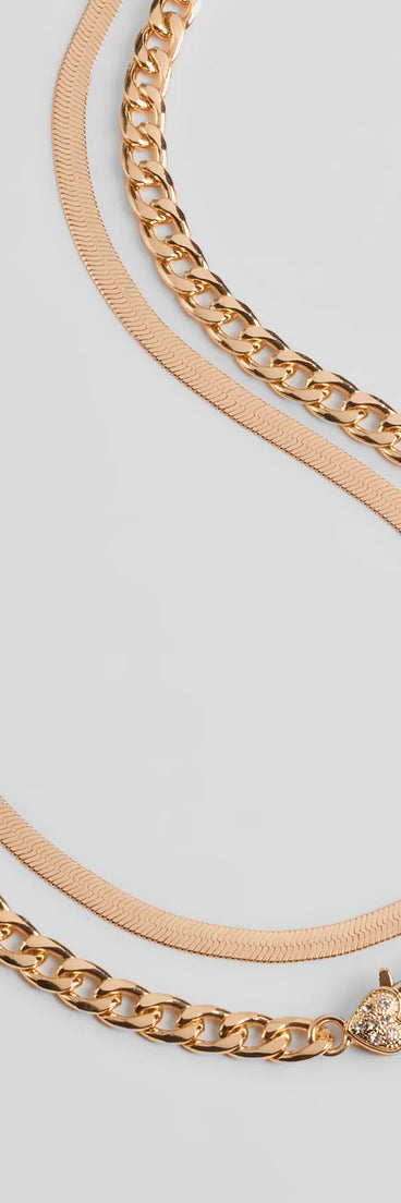 Get inspired with the Sweet And Edgy Heart Layered Chain Necklace, a feed-worthy gold piece that’s part of Windsor's updated and curated women’s clothing edit packed with must-have fall outfit ideas.