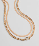 Stay on-trend this season with the Sweet And Edgy Heart Layered Chain Necklace in gold, a must-have for creating stylish and effortless spring outfits for women.