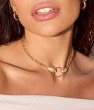 The Snake Charmer Chain Necklace in gold brings edge and energy to your vibe, ready to elevate any festival look or concert outfit.