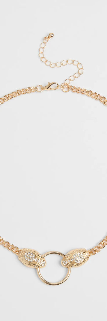 The Snake Charmer Chain Necklace in gold brings edge and energy to your vibe, ready to elevate any festival look or concert outfit.