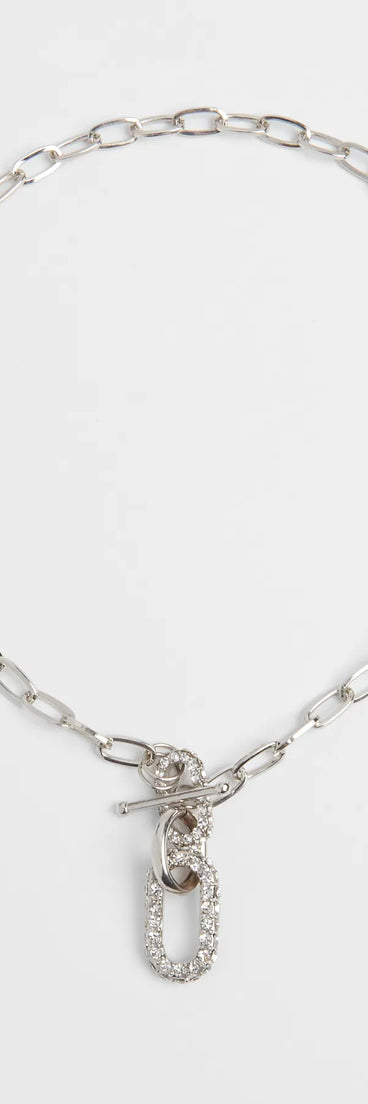 The Cultivated Glam Rhinestone Chain-Link Necklace in silver brings edge and energy to your vibe, ready to elevate any festival look or concert outfit.