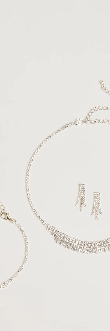 Get inspired with the Luxe Rhinestone Necklace, Earrings, And Bracelet Set, a feed-worthy silver piece that’s part of Windsor's updated and curated women’s clothing edit packed with must-have fall outfit ideas.