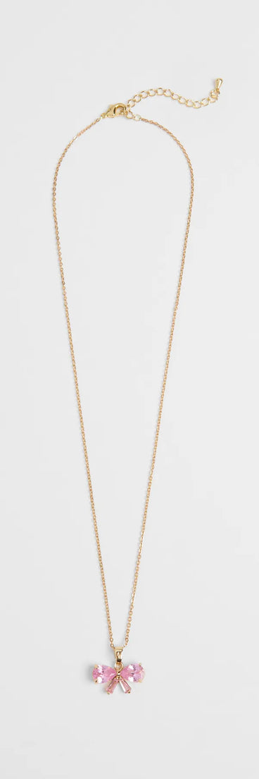 Style your vibe in seconds with the Dainty Glam Cubic Zirconia Bow Charm Necklace in pink, a fashion accessories essential that completes any outfit with ease.