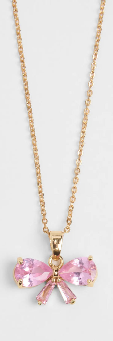 Get inspired with the Dainty Glam Cubic Zirconia Bow Charm Necklace, a feed-worthy pink piece that’s part of Windsor's updated and curated women’s clothing edit packed with must-have fall outfit ideas.