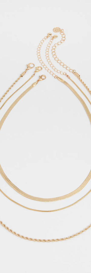 The Keep It Edgy Three-Pack Necklace Set in gold brings edge and energy to your vibe, ready to elevate any festival look or concert outfit.