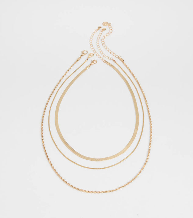 The Keep It Edgy Three-Pack Necklace Set in gold brings edge and energy to your vibe, ready to elevate any festival look or concert outfit.