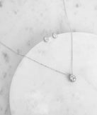 Get ready for any event with the Cubic Zirconia Teardrop Necklace And Studs in silver, an essential start to creating a versatile outfit for women for parties, cocktail hours, or Valentine's Day events.