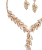 Stay on-trend this season with the Luxe Leaf Lariat And Duster Earrings, a must-have for creating stylish and effortless spring outfits for women.