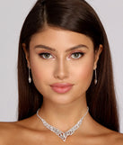Get ready for any event with the Elegant Tear Drop Rhinestone Set in silver, an essential start to creating a versatile outfit for women for parties, cocktail hours, or Valentine's Day events.