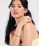 Stay on-trend this season with the Sparkling Addition Heart Charm Layered Bracelet in gold, a must-have for creating stylish and effortless spring outfits for women.
