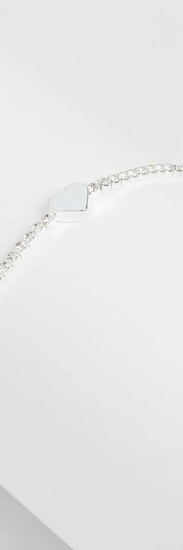 The Heart It Rhinestone Bracelet in silver brings sleek style to any graduation outfit, from cap and gown to after-party.
