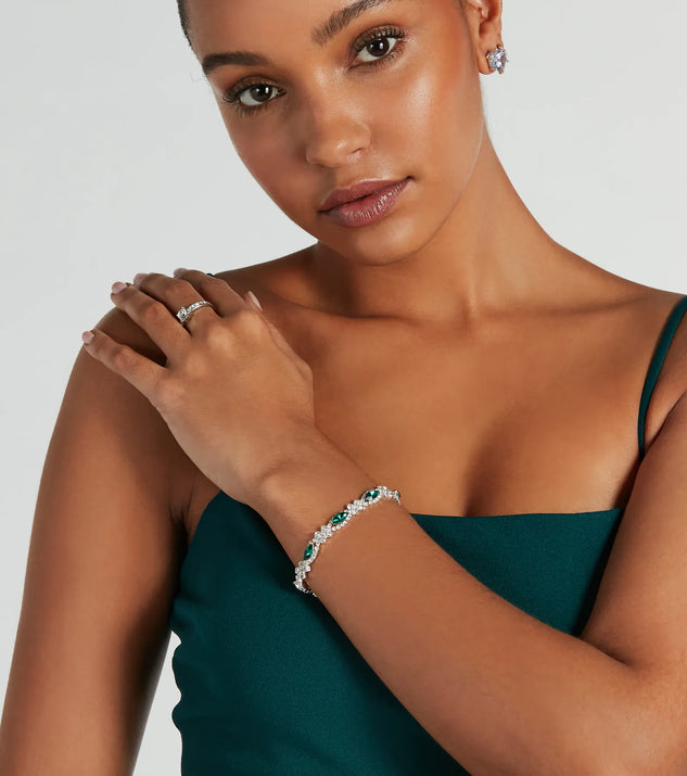 The Glistening Glamour Gemstone And Rhinestone Bracelet helps create a chic emerald green women's cocktail outfit with a trendy texture and stylish design, ideal for wedding guest cocktail outfits or dinner parties.