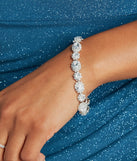 The Life Is A Dream Rhinestone Clasp Bracelet helps create a chic silver women's cocktail outfit with a trendy texture and stylish design, ideal for wedding guest cocktail outfits or dinner parties.