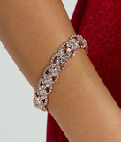 The Simply Dazzle Rhinestone Clasp Bracelet helps create a chic rose gold women's cocktail outfit with a trendy texture and stylish design, ideal for wedding guest cocktail outfits or dinner parties.