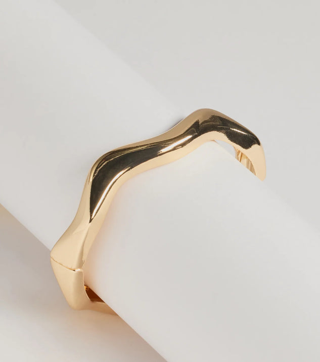 The Classic Twist Wavy Metal Clasp Bracelet in gold is a women's workwear essential with an elevated fabric and chic silhouette, ideal for layering and versatile enough to take your look from office chic to going-out ready!