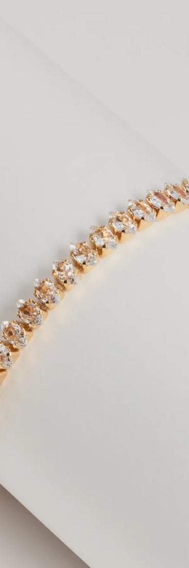 Get ready for any event with the Feeling Luxe Rhinestone Slider Bracelet in gold, an essential start to creating a versatile holiday outfit for women for holiday parties, cocktail hours, or NYE events.