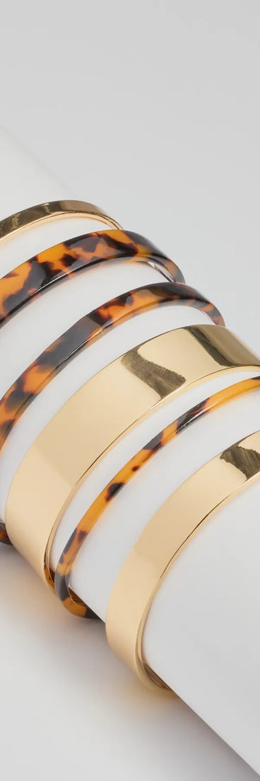 Boldy Layered Metal And Tortoiseshell Bangle Multipack, a trendy tortoise addition to women's going-out outfits, is ideal for Christmas party outfits, chic NYE attire, or winter night-out looks that keep you on-trend!