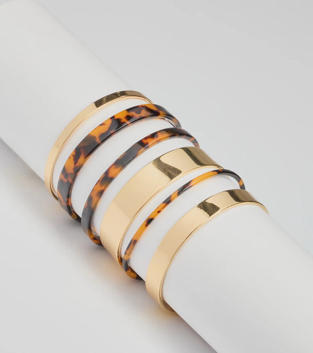 Boldy Layered Metal And Tortoiseshell Bangle Multipack, a trendy tortoise addition to women's going-out outfits, is ideal for Christmas party outfits, chic NYE attire, or winter night-out looks that keep you on-trend!