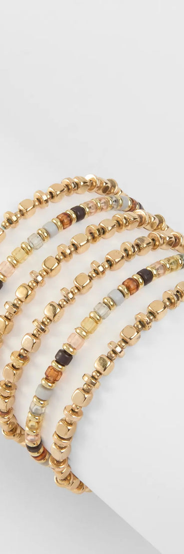 Stay on-trend this season with the Always A Favorite Six Pack Bracelet Set in multi-color, a must-have for creating stylish and effortless spring outfits for women.