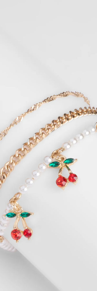 Stay on-trend this season with the Cherry Picking Three-Pack Bracelet Set in gold, a must-have for creating stylish and effortless spring outfits for women.