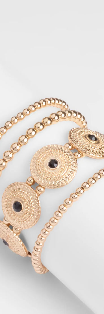Stay on-trend this season with the Bold Move Five-Pack Bracelet Set in gold, a must-have for creating stylish and effortless spring outfits for women.