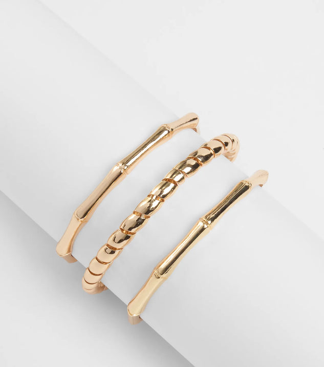 Stay on-trend this season with the Three's A Crowd Bangle Bracelet Set in gold, a must-have for creating stylish and effortless spring outfits for women.