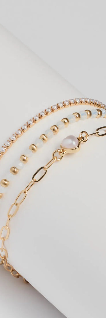 Glam Moment Faux Pearl Bracelet Multipack, a trendy gold addition to women's going-out outfits, is ideal for Christmas party outfits, chic NYE attire, or winter night-out looks that keep you on-trend!