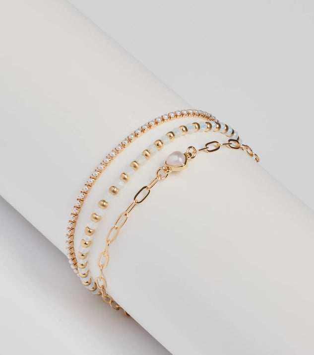 Glam Moment Faux Pearl Bracelet Multipack, a trendy gold addition to women's going-out outfits, is ideal for Christmas party outfits, chic NYE attire, or winter night-out looks that keep you on-trend!
