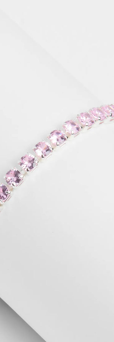 Get inspired with the Glitzy Shine Cubic Zirconia Tennis Bracelet, a feed-worthy pink piece that’s part of Windsor's updated and curated women’s clothing edit packed with must-have fall outfit ideas.