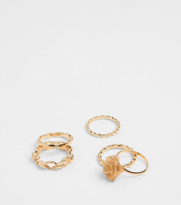 The Delicate Rose Seven-Pack Ring Set in gold brings edge and energy to your vibe, ready to elevate any festival look or concert outfit.