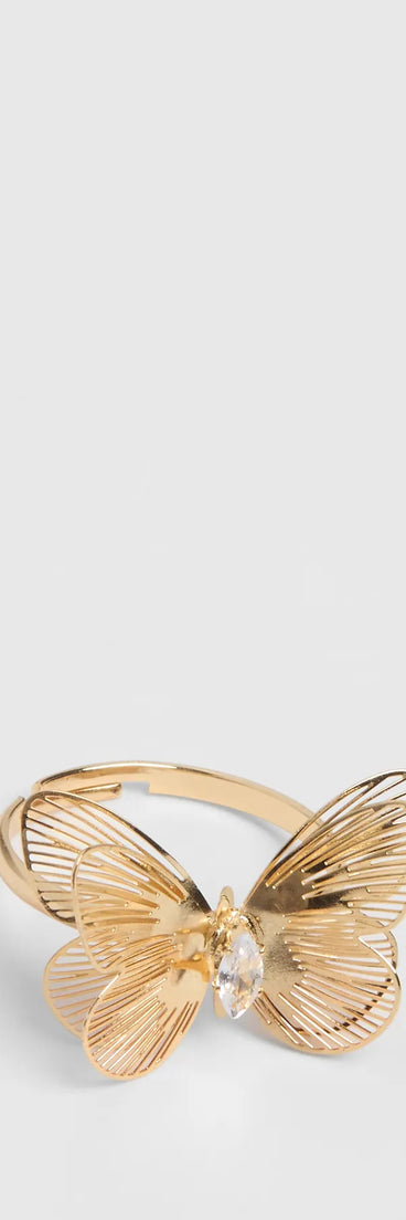 Stay on-trend this season with the Whimsical Beauty Rhinestone Butterlfy Ring in gold, a must-have for creating stylish and effortless spring outfits for women.
