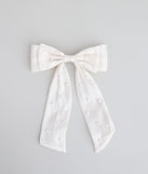 Tied With a Pearl Hair Bow