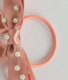 
Upgrade your style game for 2025 with the Posh Faux Pearl Satin Bow Three-Pack Hair Ties, perfect for any fashion-forward wardrobe.