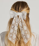 
Upgrade your style game for 2025 with the Sweet And Perfect Floral Lace Bow Hair Barrette in white, perfect for any fashion-forward wardrobe.