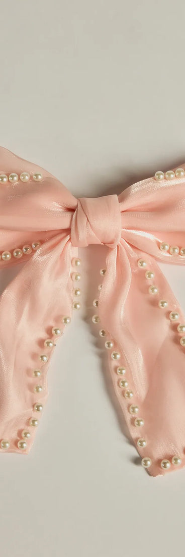 
Upgrade your style game for 2025 with the Feeling So Charmed Faux Pearl Chiffon Hair Bow in pink, perfect for any fashion-forward wardrobe.