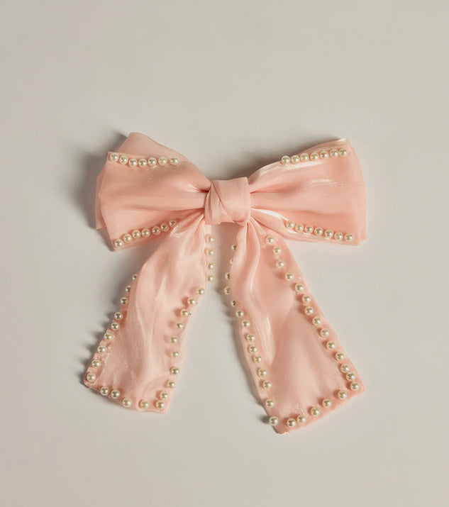 
Upgrade your style game for 2025 with the Feeling So Charmed Faux Pearl Chiffon Hair Bow in pink, perfect for any fashion-forward wardrobe.