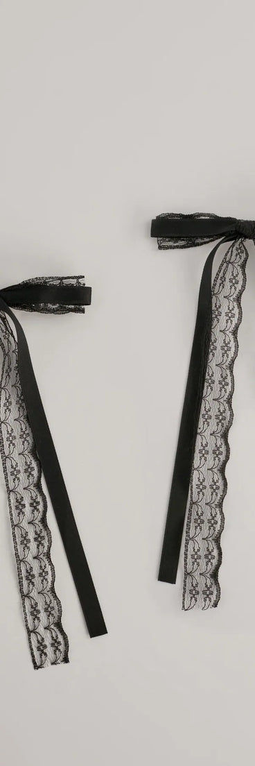 
Upgrade your style game for 2025 with the Dainty Chic Lace Bow Barrettes in black, perfect for any fashion-forward wardrobe.