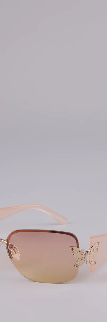 Style your vibe in seconds with the Butterfly Effect Rimless Square Sunglasses in pink, a fashion accessories essential that completes any outfit with ease.
