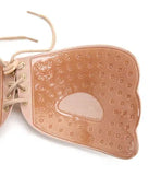 The Adhesive Push Up Bra in natural brings sleek style to any graduation outfit, from cap and gown to after-party.