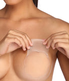 The Reusable Gel Lift Pasties in natural brings sleek style to any graduation outfit, from cap and gown to after-party.