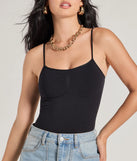 Elevate your winter outfits with the Clean Lines Sleeveless Seamless Knit Bodysuit, a black bodysuit designed for confident and effortless styling with anything from mini skirts to high-waist jeans.
