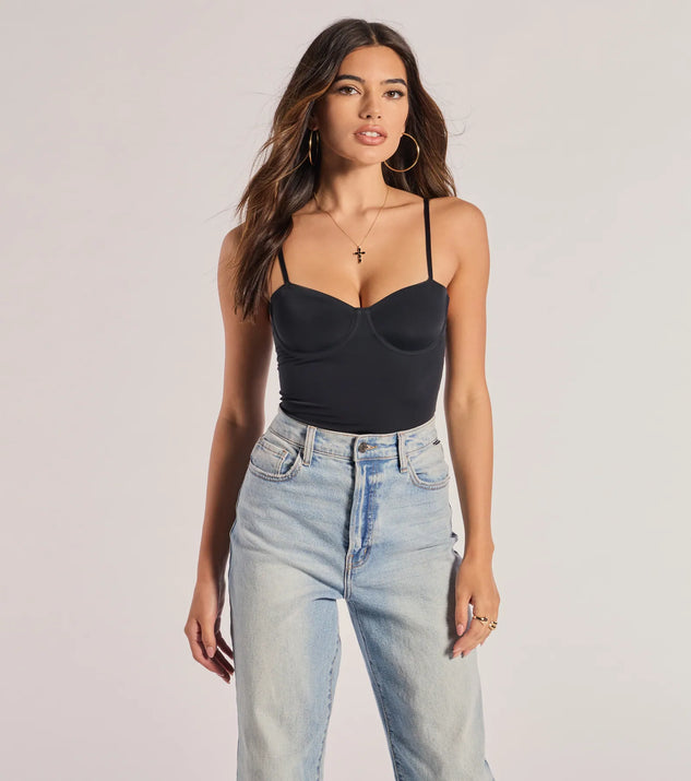 Elevate your winter outfits with the One Sided Sleeveless Cutout Bodysuit, a black bodysuit designed for confident and effortless styling with anything from mini skirts to high-waist jeans.
