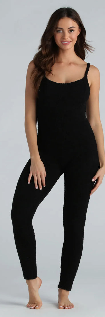 The Dressed To Lounge Chenille Knit Catsuit in black is a sleek women's catsuit featuring a chic, body-hugging silhouette with on-trend details for a striking profile, perfect for creating going-out looks or party outfits.