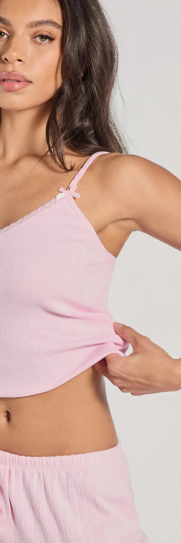 Perfect for creating a fashionable Valentine's Day outfit, the Sleeping In V-Neck Pointelle Pajama Crop Top is a chic pink top with romantic and modern flair, ideal for date night or Galentine’s celebrations.